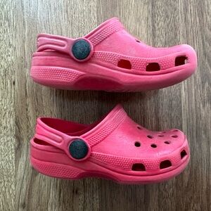 Gently used toddler crocs in red